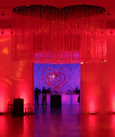A freestanding heart-shaped stand blinked with lights.