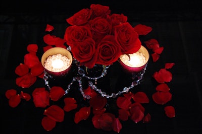 Red roses and crystals served as centrepieces on the tables surrounding the Krups Stage.