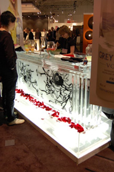 Rose petals and black etching embellished a lit-up bar made of ice.