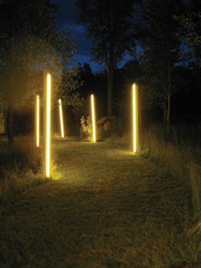 Inspired by the artwork of Dan Flavin, Levy Lighting NYC designed this installation using golden fluorescent tubes to create a mysterious feel that guided guests at a corporate event in Jackson Hole, Wyoming, from one part of the property to another.