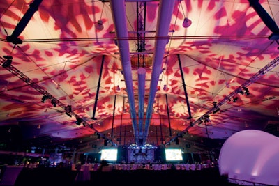 EventWorks produced a corporate event at the Sails Pavilion at the San Diego Convention Center and looked to Los Angeles's Kinetic Lighting to create projections to embellish the vast ceiling. Employing large-format projectors that use a film scroll, Kinetic crisply and seamlessly presented a changing display of images, including peppermints, sliced oranges, and flames.