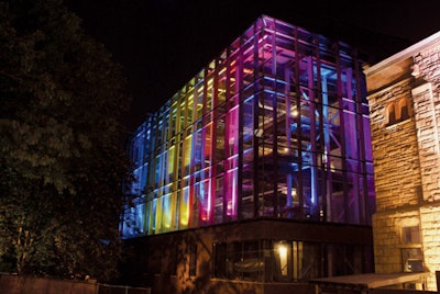 While Toronto's Royal Ontario Museum celebrated the launch of its Crystal Building, the adjacent Royal Conservatory of Music wanted to pretty up its construction project and intrigue passersby. Parallel Production Services turned to Chris Newkirk of Screamlab Inc. to create a one-night-only dynamic color treatment that gradually covered the building; varying solid tones and textural effects moved across the structure in a subtle repeating loop.