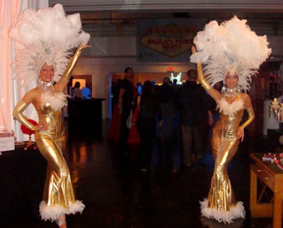 Two Vegas-style showgirls welcomed guests as they arrived at the Paris Theatre.