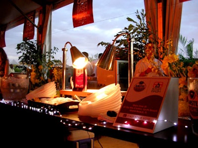 Each culinary competitor, identified by overhead signage, had work stations lining the perimeter of the tent.