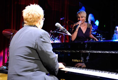 Elton John brought Mary J. Blige on stage to sing 'I Guess That's Why They Call it the Blues' with him.