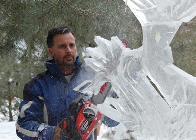 An artist competing in the eighth annual Sassafraz ice-carving competition used a chainsaw to create a scuplture sponsored by In Beauty Spa.