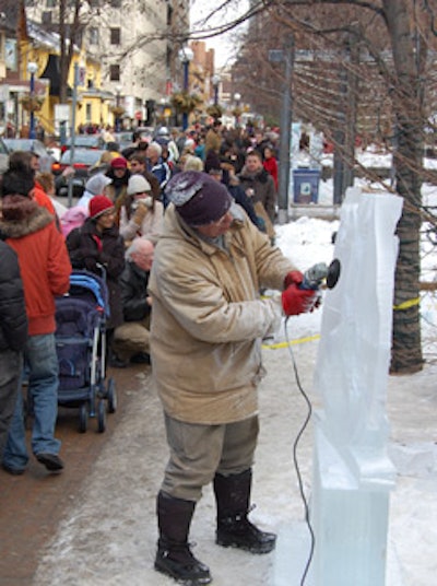 Cumberland Avenue attracted a crowd of onlookers who watched the ice-carving competition in the Village of Yorkville Park.