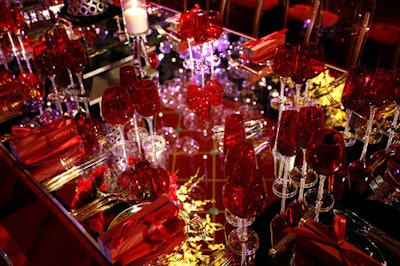 Red wine glasses sat atop tables.