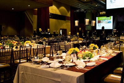 The grand ballroom was set with long tables, evoking a family-style Tuscan feast.