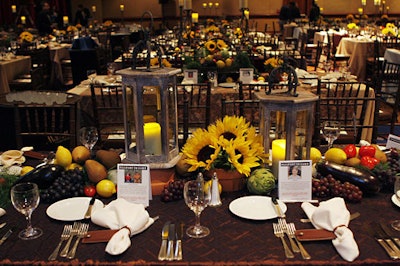 Earth tones, sunflowers, and vegetables covered the tables.