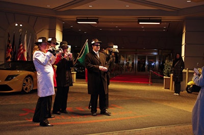 The hotel entrance had a Lamborghini on display and M.D.A. staffers dressed as paparazzi.