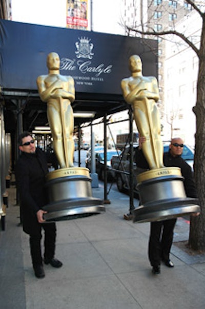 At eight feet tall, the statues were heavily guarded before the official event.