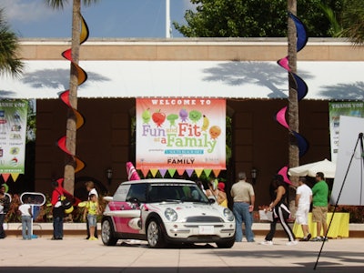 A pink Mini Cooper, complete with airplane wings, courtesy of Delta Airlines, was parked outside the entrance to Jungle Island.