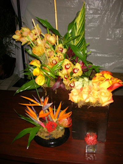 Arrangements of yellow and orange roses and orchids, along with other exotic flowers, were place on the tables in the Zen Garden lounge area.