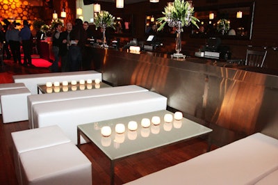 Sleek white benches and frosted-glass tables provided an area for guests to lounge.