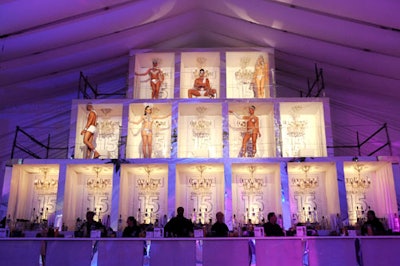 Above the bar, a three-story alcove structure held male and female models covered in crystals.