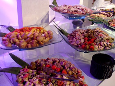 In addition to paella and assorted cheeses, guests were also offered different pasta salads at an antipasto station.