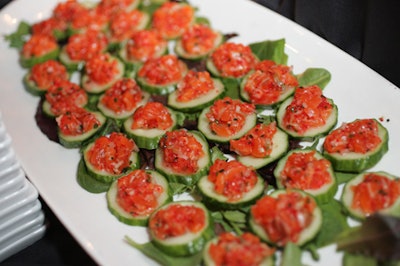 Cucumber rounds on spinach leaves topped with smoked salmon were part of the extensive finger-food selection.