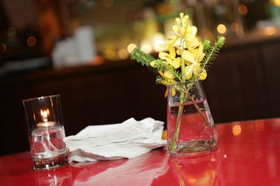 The simple floral centrepieces were made from daffodils and sprigs of pine.