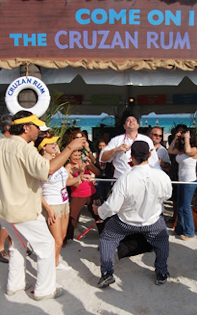Chefs took a break to enjoy a game of limbo outside the Cruzan Rum lounge.