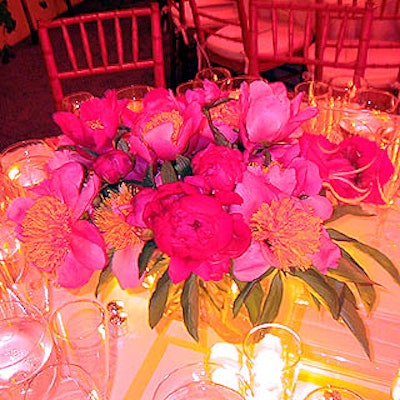 Centerpieces of pink peonies completed the pink theme of the dining room's decor.