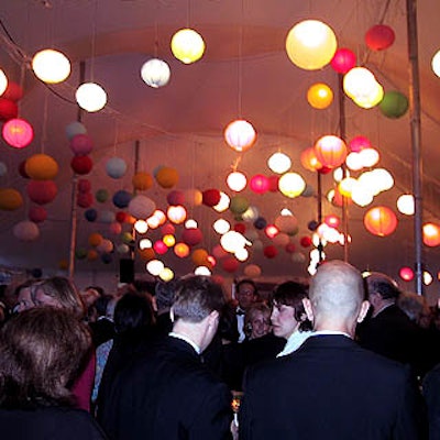 For the cocktail hour, multicolored lanterns glowed brightly against the white tent walls.