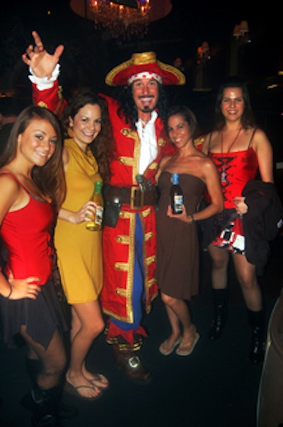 Representatives from Captain Morgan Rum and Gold Peak Iced Tea, both event sponsors, pose with the captain himself.