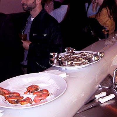 Glass served oysters and salmon at Mademoiselle's party.