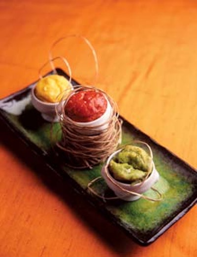 Sweet corn, red pepper, and green pea soufflés served in mini terrines from Design Cuisine in Washington