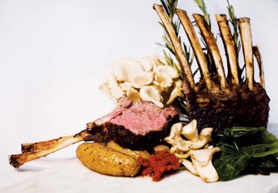 Locally sourced porcini-crusted rack of lamb with spinach, oyster mushrooms, fingerling potatoes, and tomato concassé from Chicago's Greg Christian Catering
