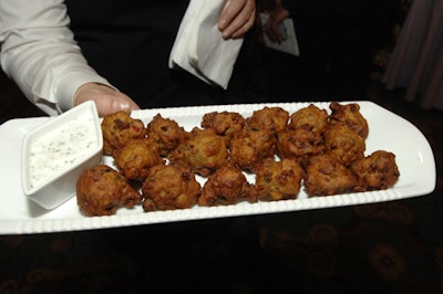 Servers passed vegetable pakoras with yogurt dip at the cocktail reception.