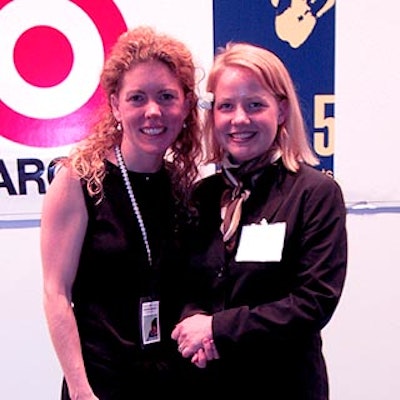 Jennifer Held of Target community relations and Dana Larson of Ruder Finn worked to promote the Target Corporation and High 5 Ticket to the Arts' 2001: An Arts Odyssey launch party.