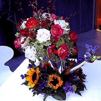 Mari Nelson of Creation Unlimited made some gorgeous flower arrangements set in Michael Graves-designed watering cans.