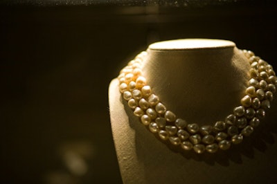 For a charitable donation, guests received a martini, a raffle ticket, and a chance to win a three-strand baroque pearl necklace designed by Myles Mindham.