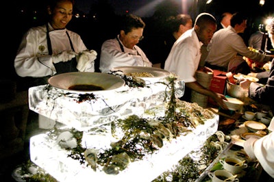 The V.I.P. reception included a glowing raw bar of Kumamoto oysters, caviar, and Florida lobster cone.