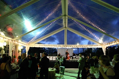 In addition to the indoor ballroom, the event continued in a tented area on the golf course patio.