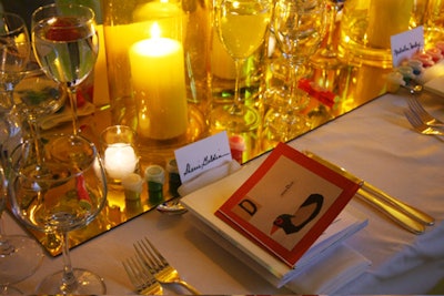 At each place setting, pots of paint and crayons enabled guests to decorate the canvas table cloths.