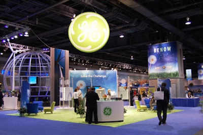 G.E. evoked the sun (for its logo) and the earth, with a green-carpeted living-room space.