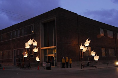 Giant torches made from white fabric marked the entrance to the event.