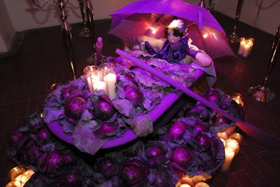 A performer soaking in a clawfoot tub filled with purple cabbages provided one of the night's more surreal moments.