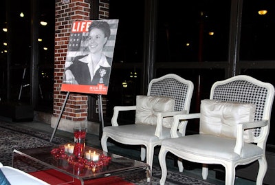 The cocktail area featured six lounges filled with white furniture and blown-up images from Life magazine.