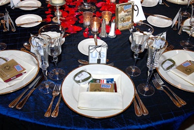Each place setting featured souvenir dog tags and postcards that guests could send to the troops from special mailboxes.