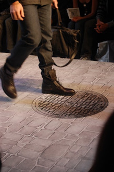 A decal of a street surface, complete with manhole covers, decorated Monarchy's runway.