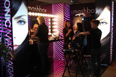 Smashbox artists did makeup touch-ups in the lobby, at a brightly colored booth in shades of purple.