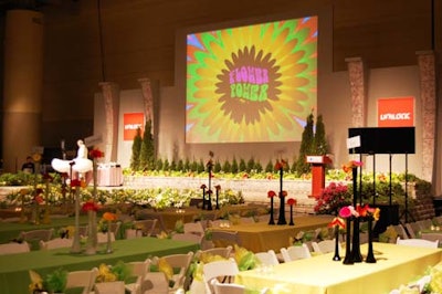 Tables dressed in yellow and green provided reserved seating for guests in front of the Unilock Celebrity Stage, where the opening ceremonies took place.