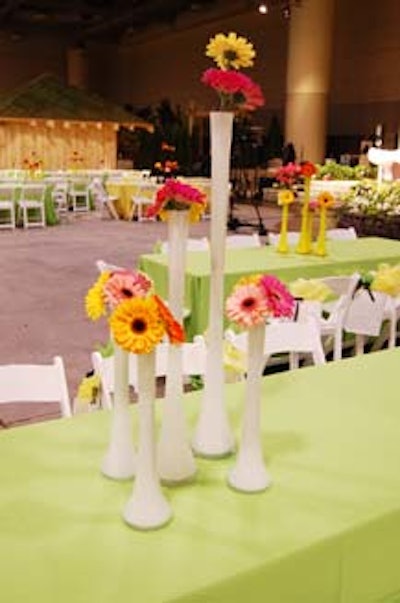 Colourful gerberas topped tables.
