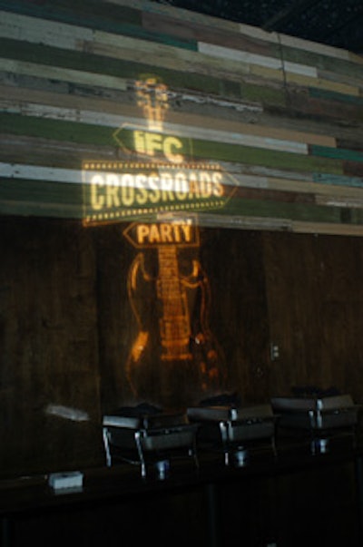 Among the many gobos projected onto the Parish walls was the Crossroads party logo, which matched the IFC logo with a guitar.