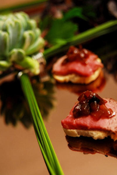 Hors d'oeuvres served at the event included seared balsamic glazed tenderloin with red onion confit.