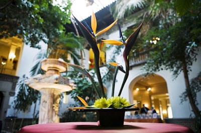 Tropical-style florals in the reception area matched the garden setting.