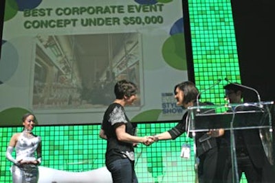 Kim Graham of Kim Graham & Associates accepted the award for Best Corporate Event Concept Under $50K from BizBash Toronto bureau chief Susan O'Neill.